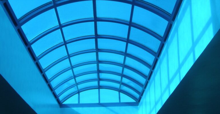 Retractable Skylight with curved polycarbonate sheets and glass roof